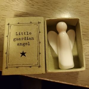 Guardian angel figurine. New